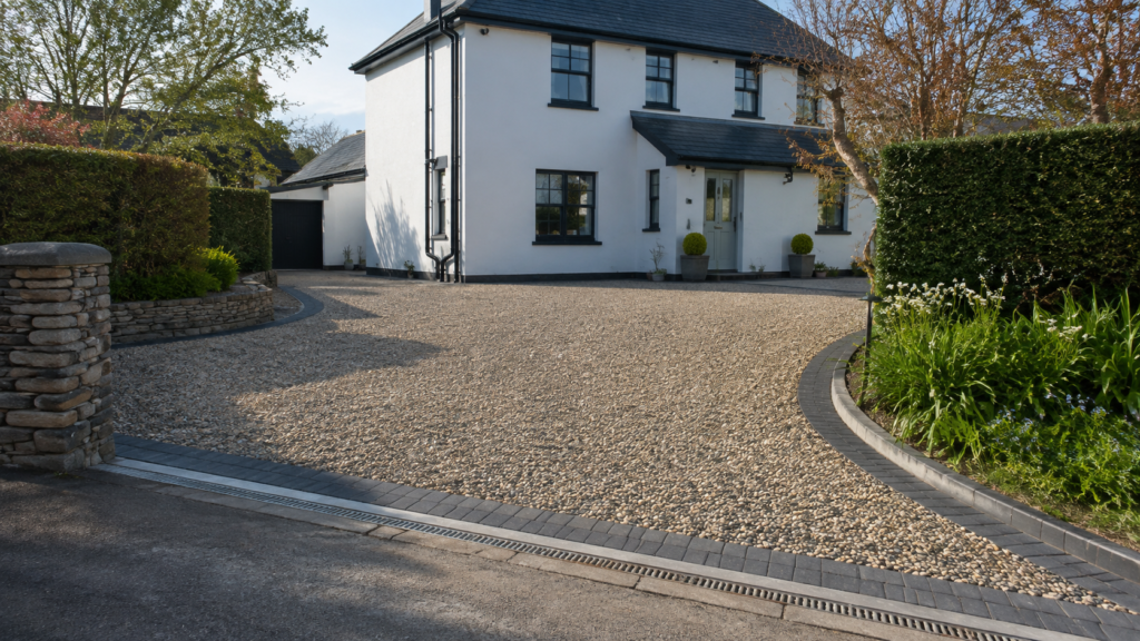 Completed flush dropped kerb and tarmac driveway entrance in Torquay